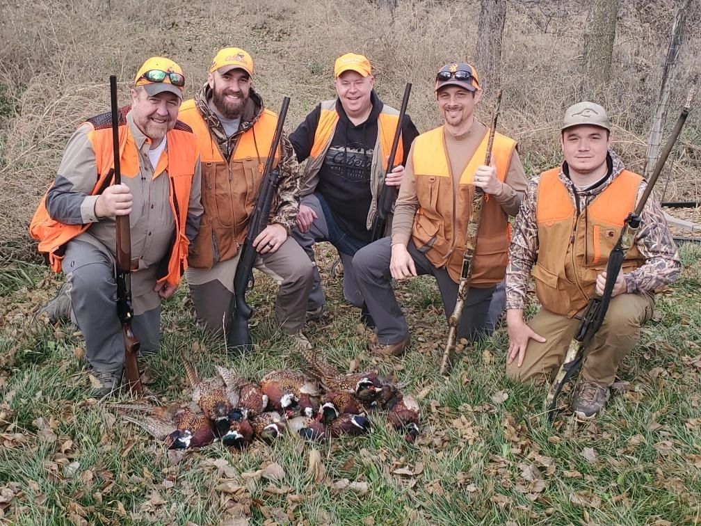 Father and son pheasant hunting in Pukwana, SD