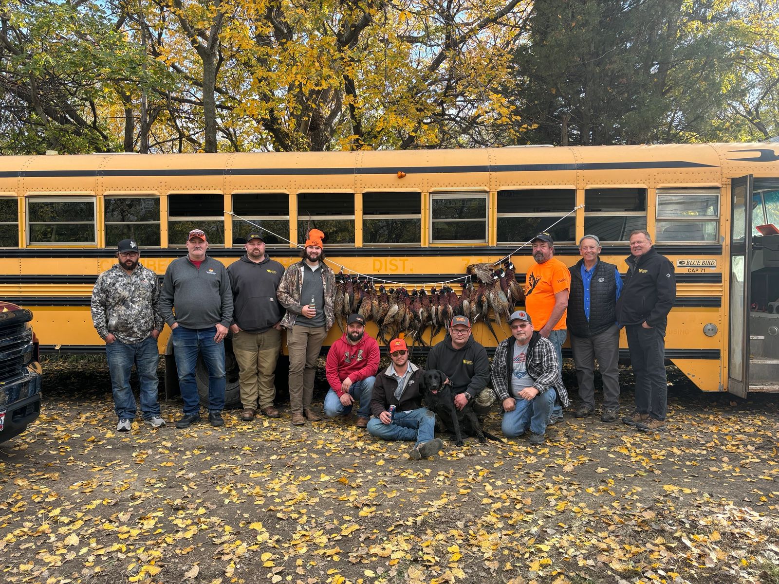 Roosters in hand after a South Dakota pheasant hunt in Pukwana, SD