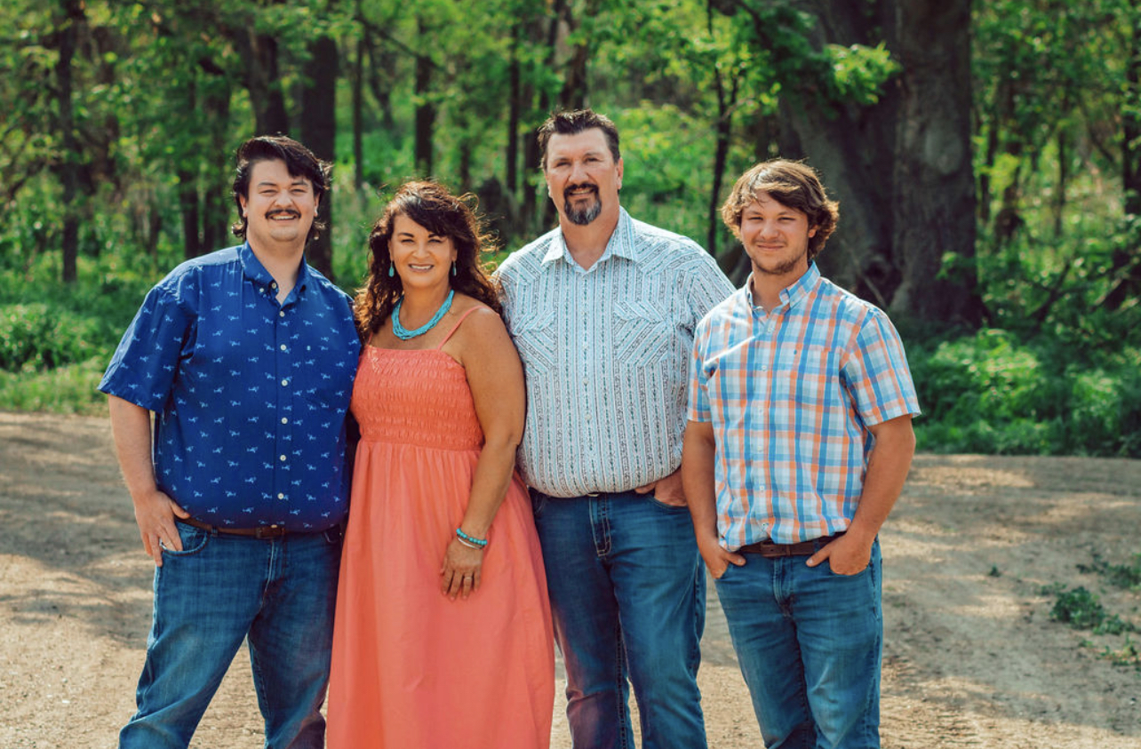 The Graves family in pheasant hunting gear out in the South Dakota fields